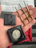 Swords Thru Half Dollar